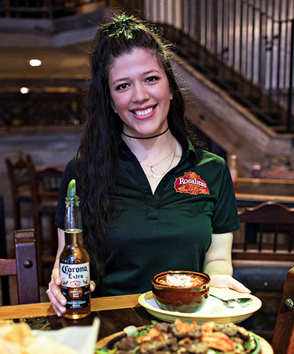 Rosalita's Cantina server with food and beer